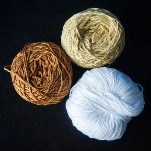 Cotton yarn in white, yellow and caramel