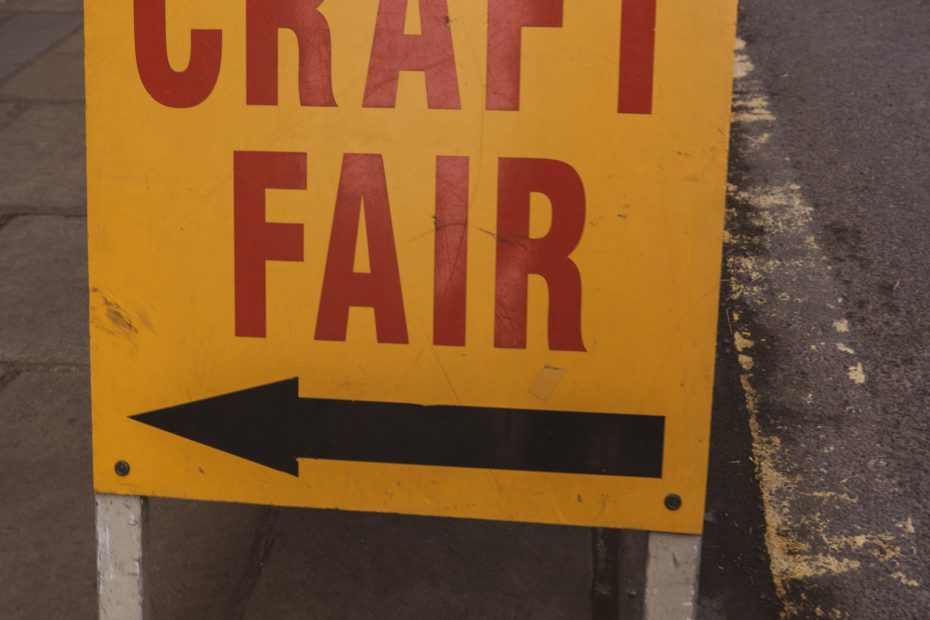 A sign for a local craft fair